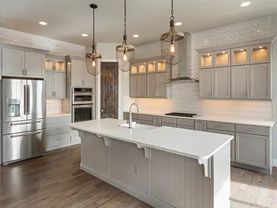 White kitchen with custom glass cabinets
