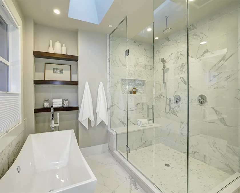 glass shower and freestanding tub