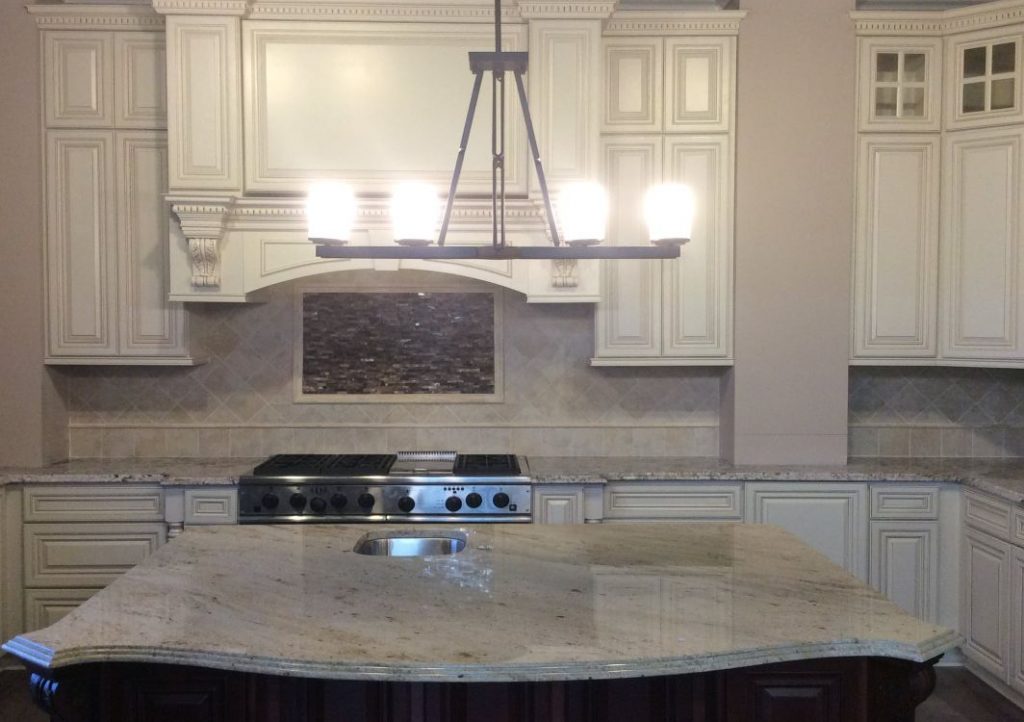 Chandelier over kitchen island