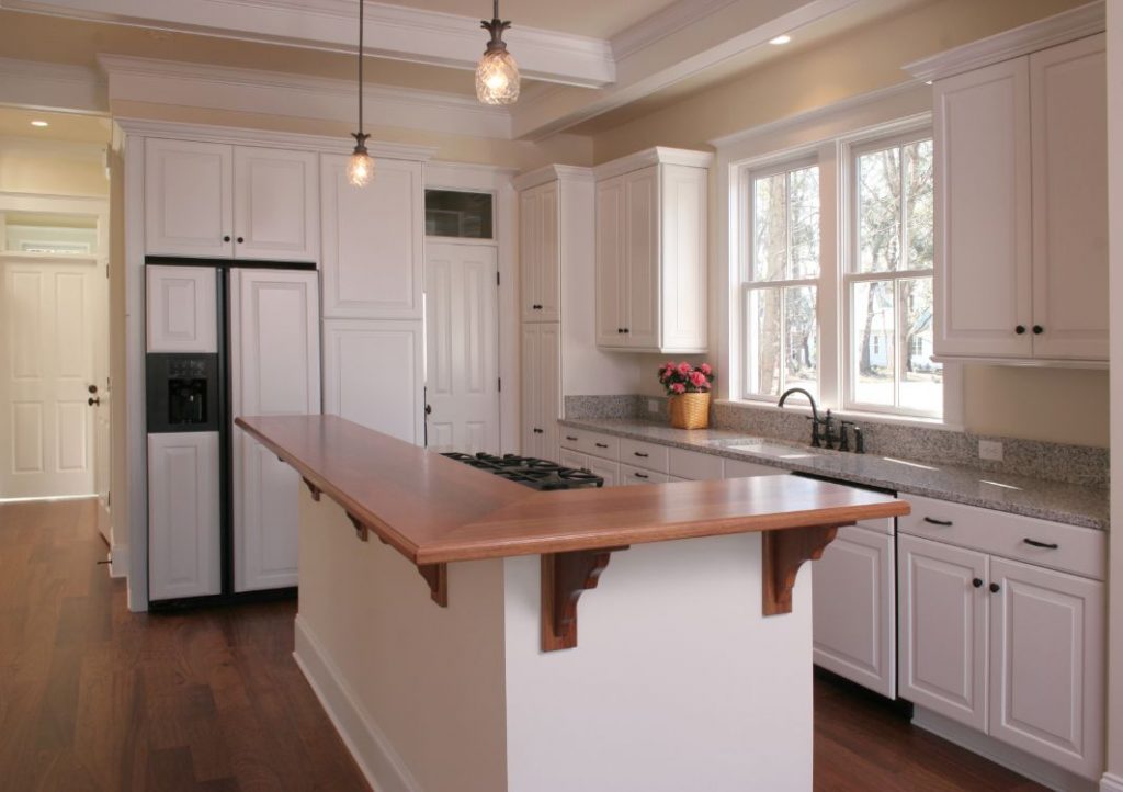 Ornate pendant lights over kitchen island