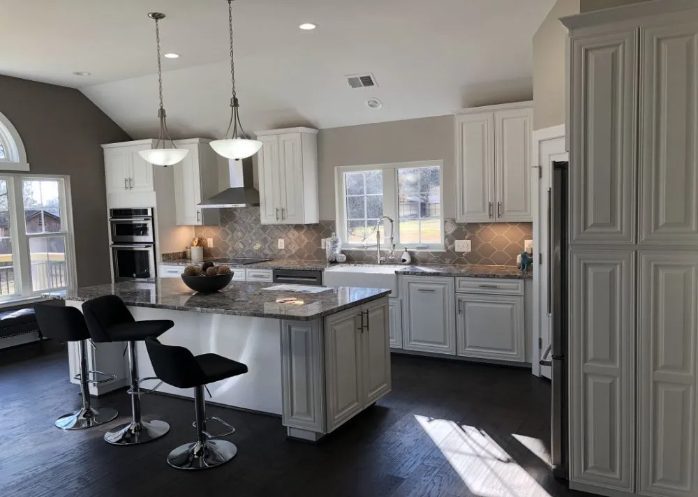 Simple pendants hanging over kitchen island