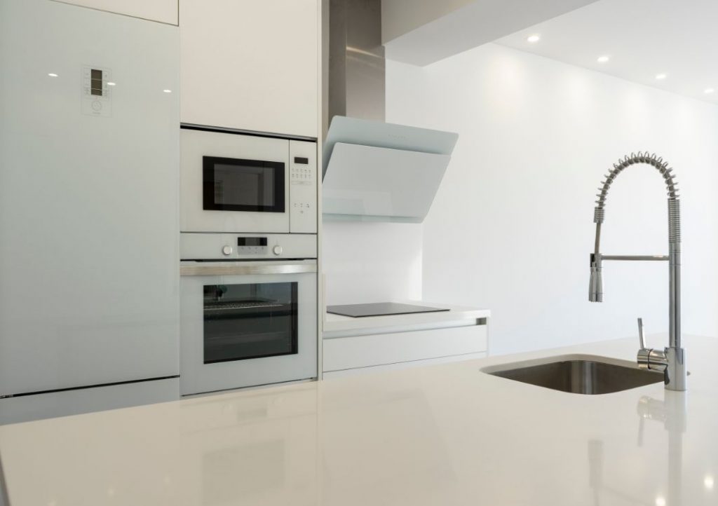 White kitchen with laminate countertops