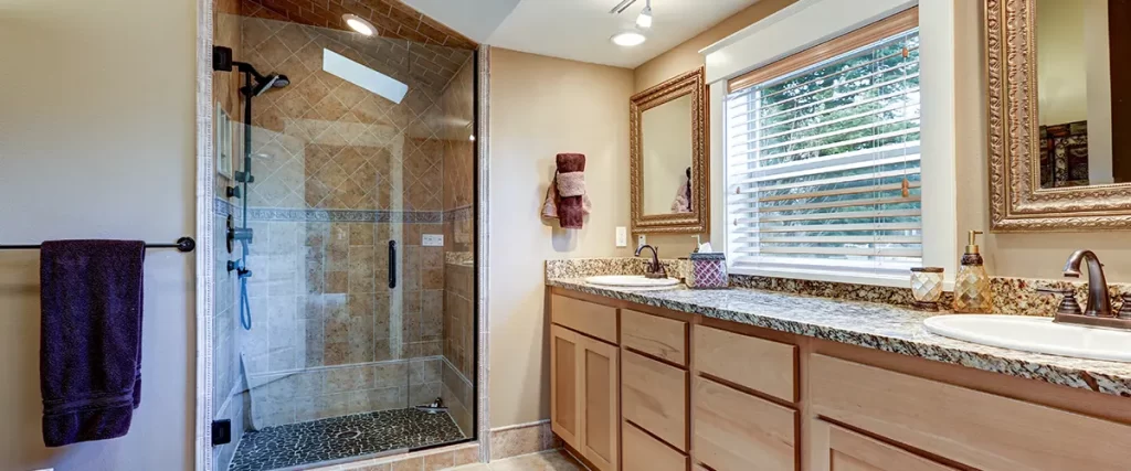 corner shower in brown bathroom