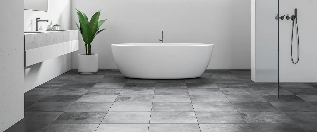 Bathroom flooring with large gray tile