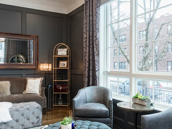 A home remodel cost with dark walls and a large window