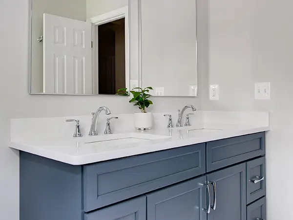 Vanity with undermount double sinks and large mirror