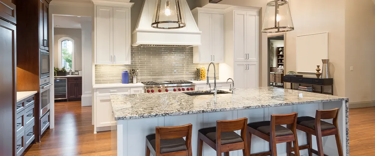 big kitchen with island and chairs