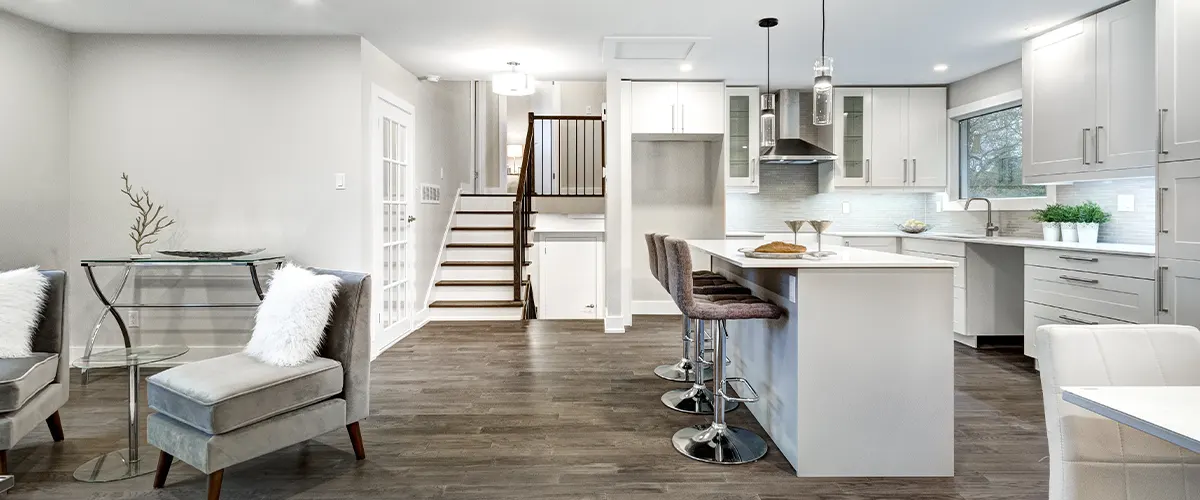 remodeled basement with living room and kitchen