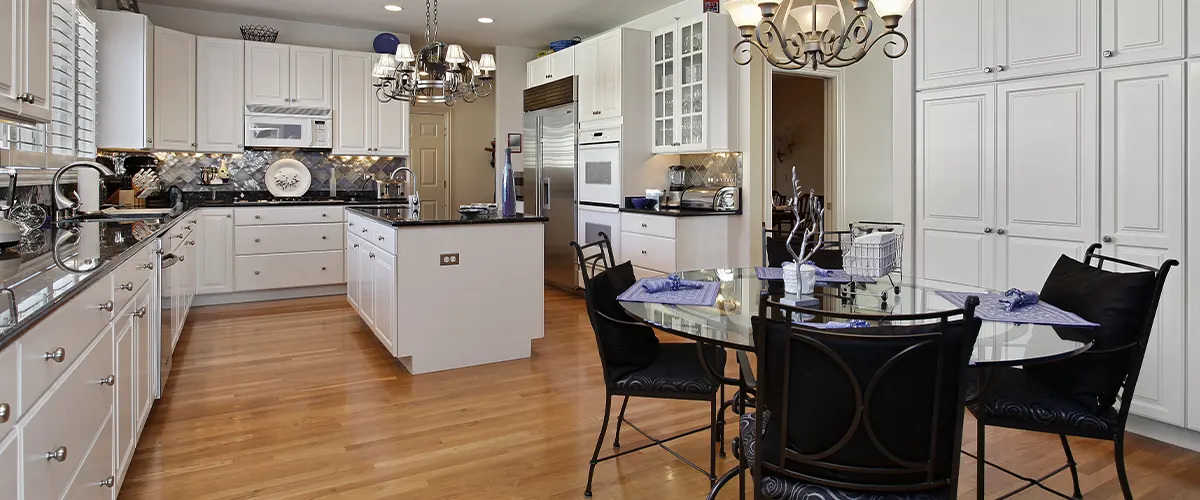 white kitchen with hardwood floors