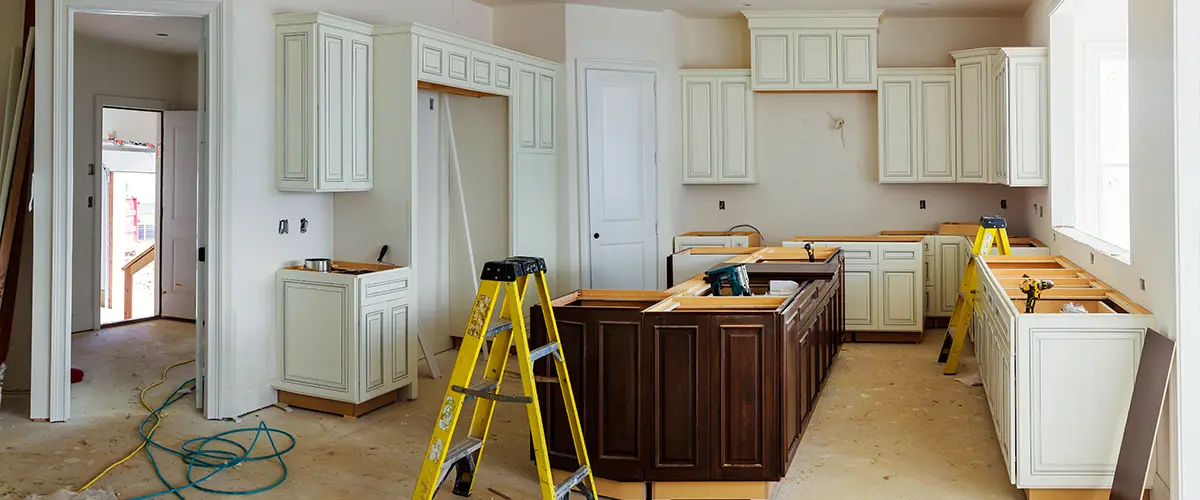 Kitchen remodeling steps with cabinets in progress