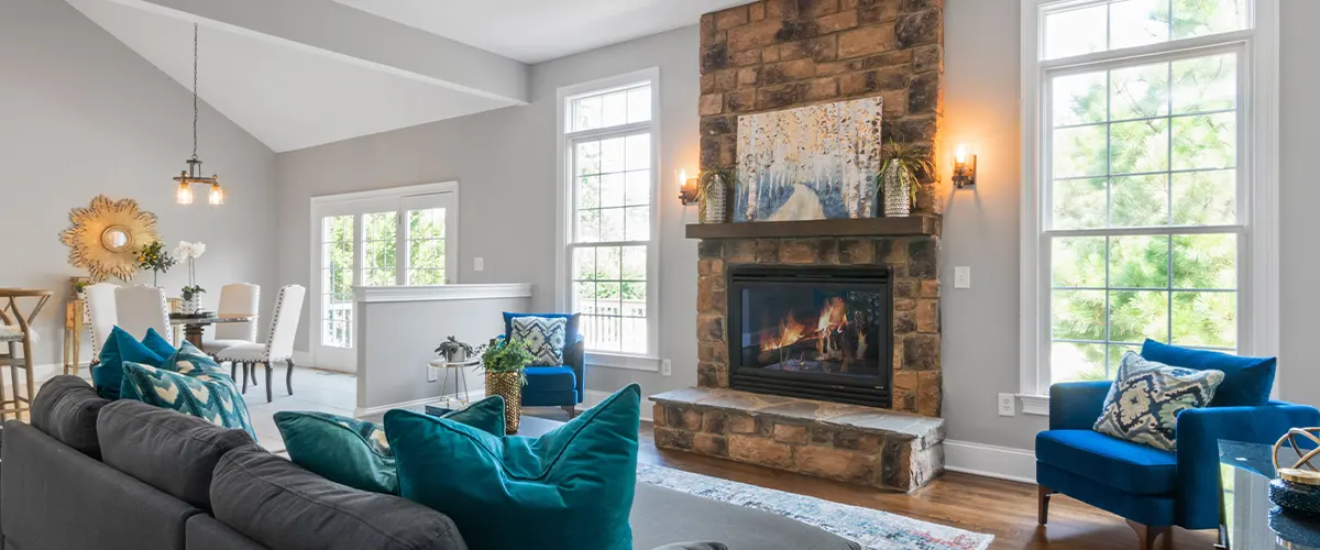 open space living area with fireplace