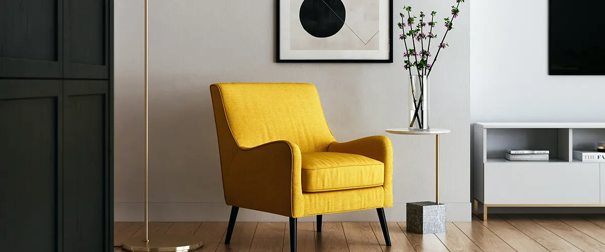 yellow chair in grey living room