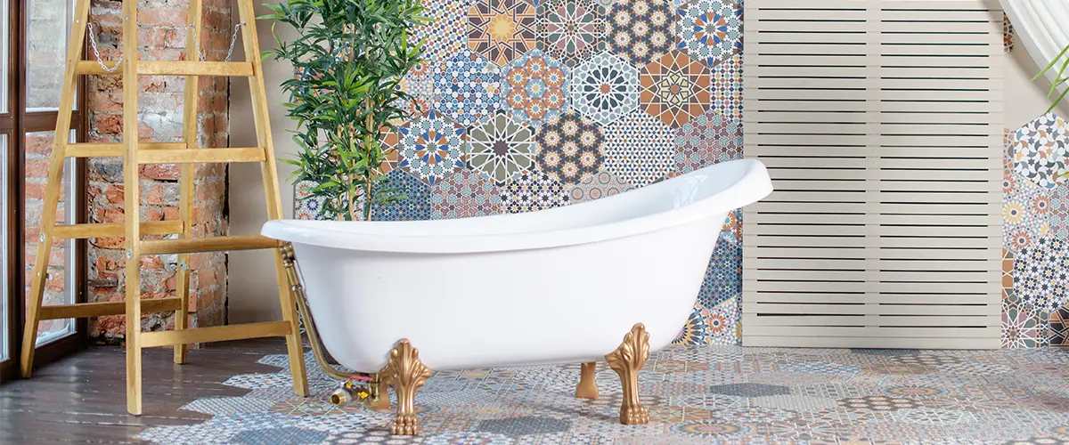 beautiful tile design with freestanding tub