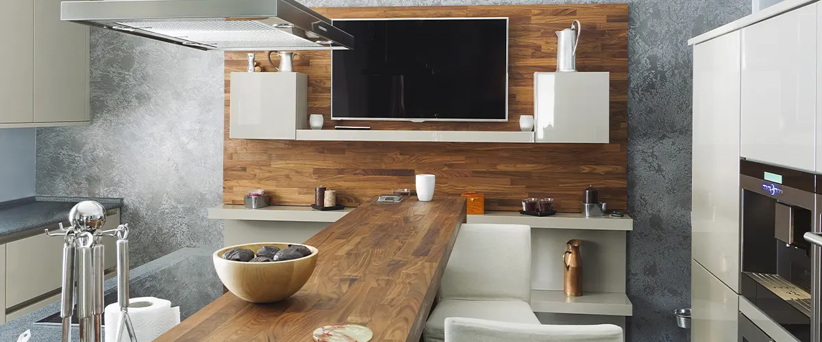 modern kitchen with a tv