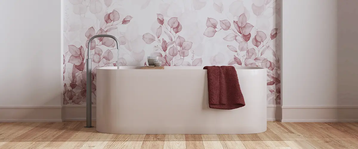 Minimalist wooden bathroom close up in white and red tones. Freestanding bathtub, wallpaper and decors.