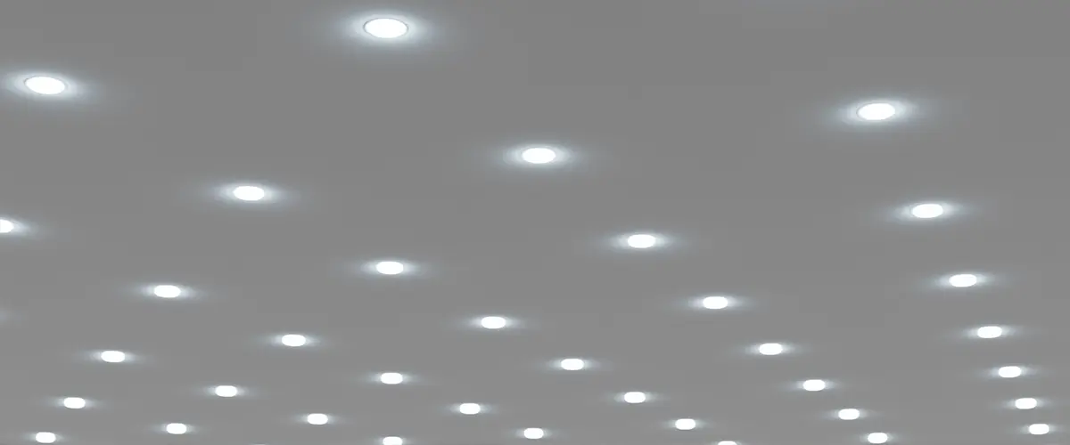 Recessed ceiling lights in a white stretch ceiling